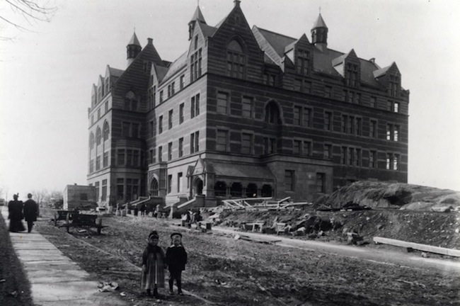 Teachers College Main Building. From The Southeast; Small Boy And Girl In Foreground (1894). Gottesman Libraries at Teachers College, Columbia University.