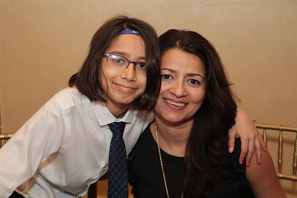 The Anti-Inaugural raised funds for The New American Leaders Project, founded by TC alumna Sayu Bhojwani (with daughter Yadna). (Photo Credit: Harold Levine)