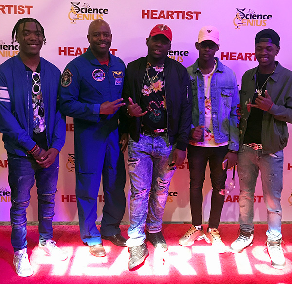 (L-R) Mitch Hunte, Melshawn Richey, Malik Tobias, Kaison Samuell and NASA Astronaut Leland Melvin at the Science Genius Battles, May 26th at the Lowes Paradise Theater in the Bronx
